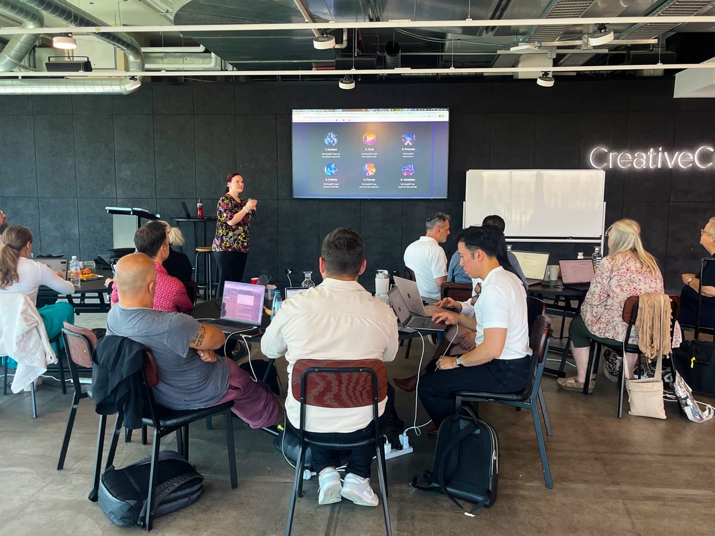 Jodee Bibaeff presenting AI tools to a workshop group